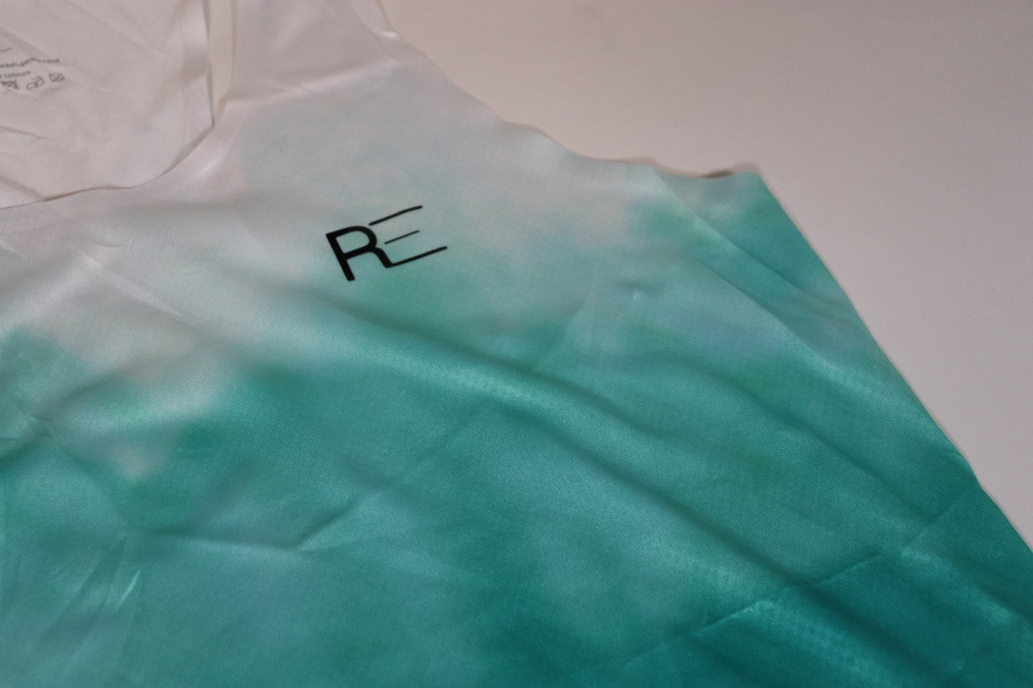 In motion racing singlet (women's s)